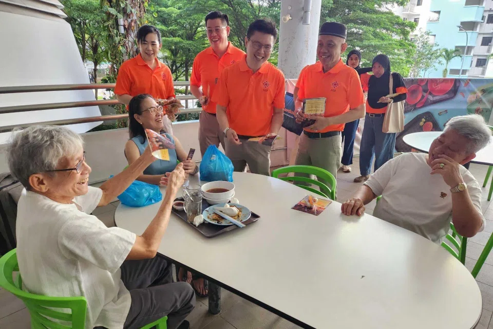 (From left) NSP's Sembawang GRC candidates Verina Ong, Raiyian Chia, Spencer Ng and Yadzeth Hairis on a walkabout at Kampung Admiralty Hawker Centre on April 24.