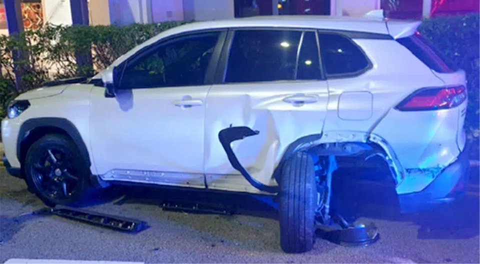 Aw's crash into the stationary vehicle damaged it, dislodging a tyre and breaking a passenger door. PHOTO: COURT DOCUMENTS