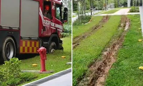 SCDF gets vehicle contractor to recover fire engine with front wheels stuck in ground in Tengah