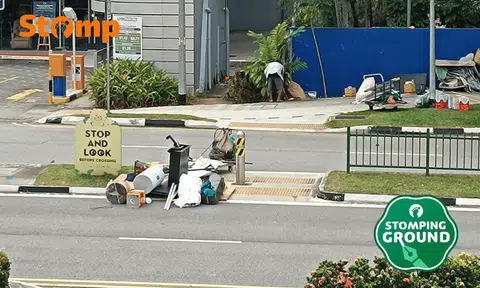 Man raises questions after pile of rubbish seen beside ‘STOP AND LOOK’ at Toa Payoh road divider