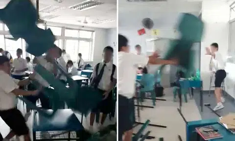 Boys' school students throw tables, chairs in classroom brawl