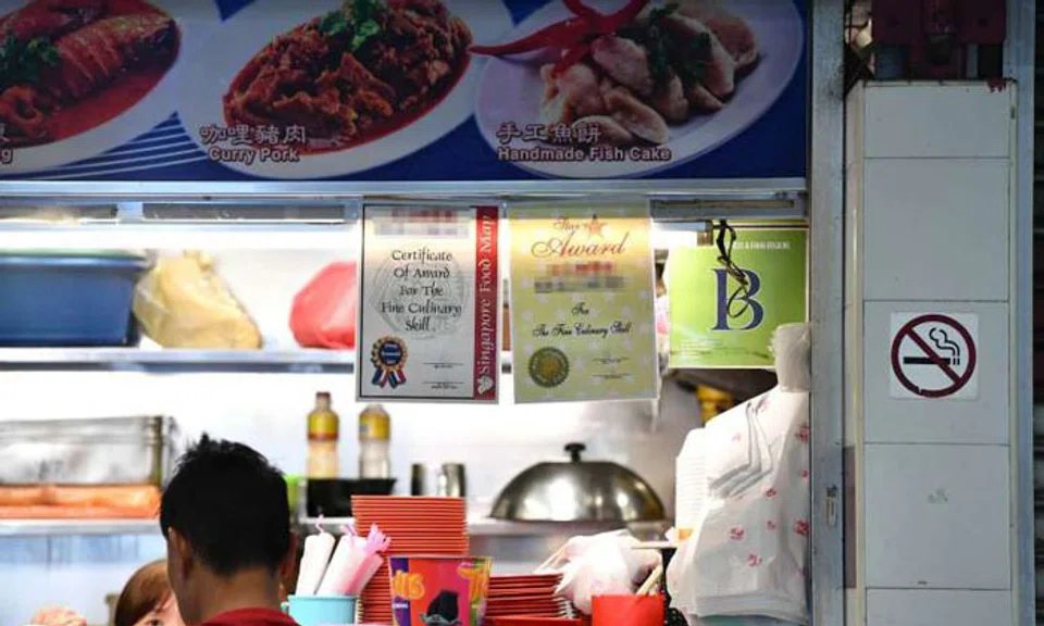 These certificates that some hawkers display at their stalls are not necessarily accolades for quality culinary skills, but advertisements instead. PHOTOS: LIM YAOHUI, SCREENGRAB FROM THE GREEN BOOK WEBSITE