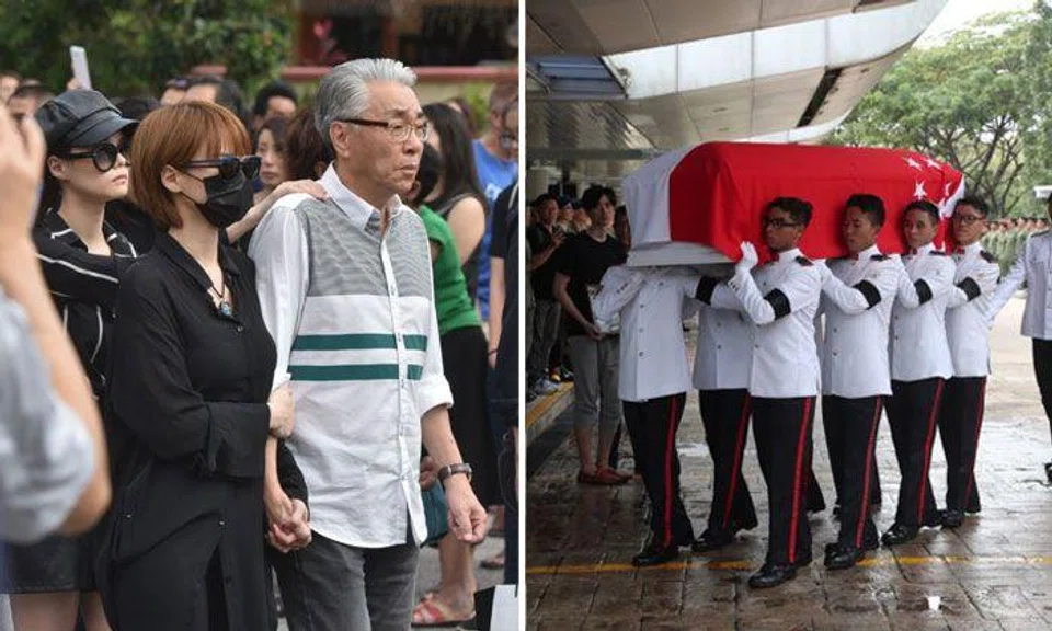 (From left) Actress Hayley Woo, her twin sister Jayley and actor Chen Shucheng walking behind the hearse of late actor Aloysius Pang, on Jan 27, 2019. ST PHOTO: JASMINE CHOONG. (Right) SAF personnel carrying the coffin of Aloysius Pang into Mandai Crematorium, on Jan 27, 2019. ST PHOTO: TIMOTHY DAVID