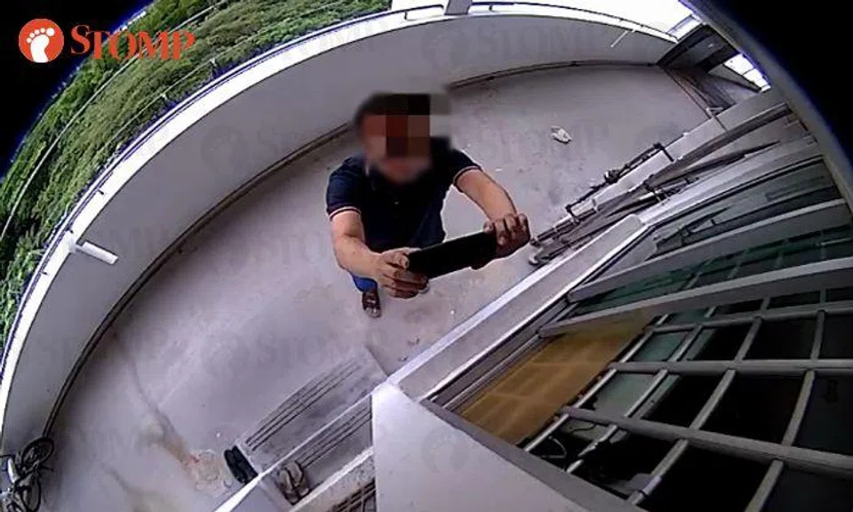 Bedok resident lodges police report after neighbour loiters and snaps photos of her unit