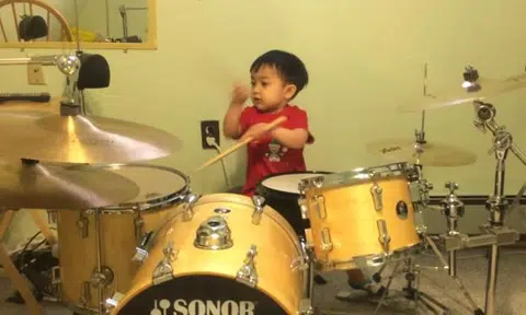 Watch this adorable three-year-old Filipino boy on the drums -- he nails it
