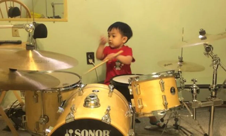 Watch this adorable three-year-old Filipino boy on the drums -- he nails it