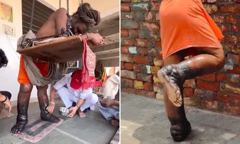 indian man stands for years to meet hindu deity