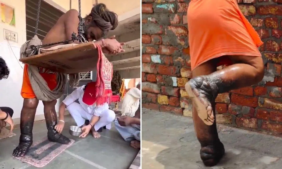 indian man stands for years to meet hindu deity