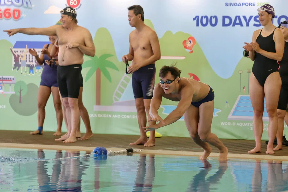 National swimmer Teong Tzen Wei (diving into the pool) said there is no need to feel pressure as he prepares for the World Aquatics Championships in July.