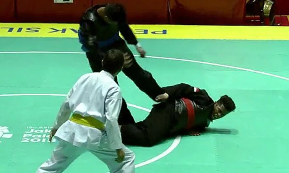 M'sian silat athlete slammed for illegally kicking S'porean opponent in the back while he was down at Asian Games