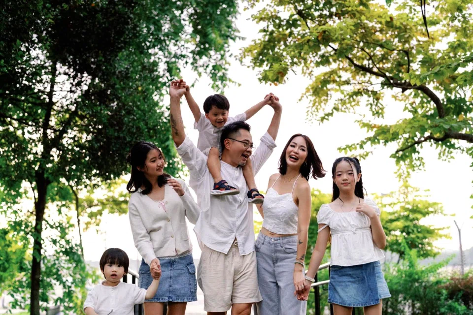 Ong and Tan and their four children, which include two daughters from their previous marriages. PHOTO: COURTESY OF DANIEL ONG