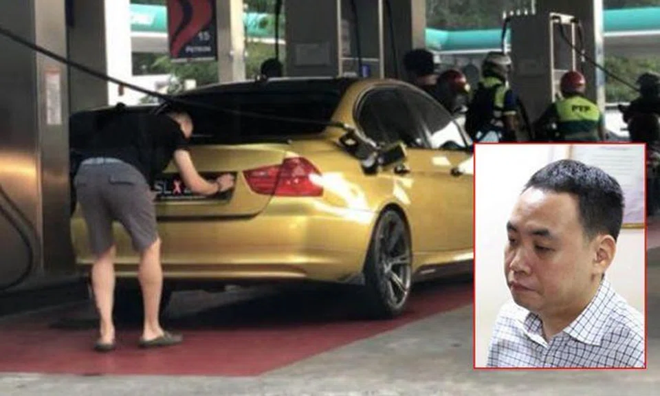 Tan Hock Lai was fined after being caught switching the licence plate on his vehicle at a petrol station in Johor Baru. Photo: Francis Liew