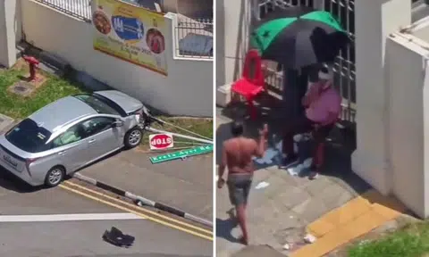 Chinatown crash topples road signs, two taken to hospital with head injuries