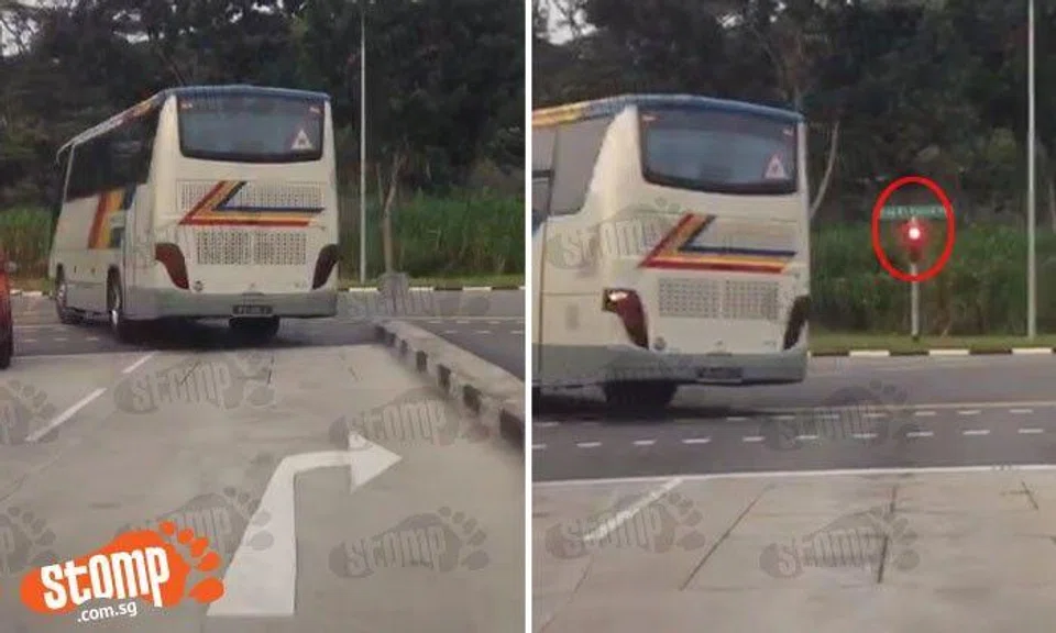 Private bus driver beats red light, then makes left turn from right-turn lane at Bukit Panjang