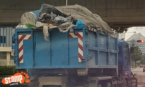 Would you dare to drive behind this tipper truck?