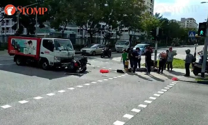 Rider taken to hospital after accident with lorry at Woodlands Avenue 7 ...