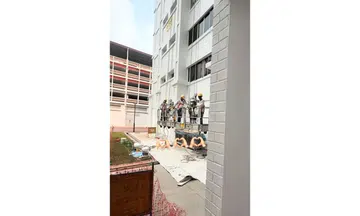 woman paint HDB walls workers coffee