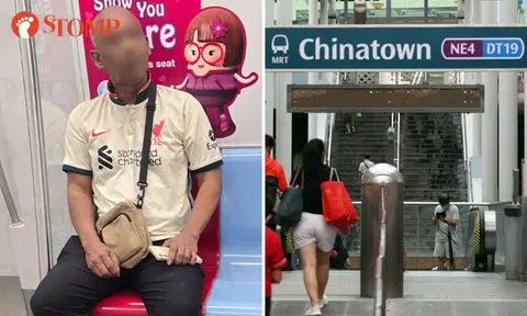 man takes woman's photo on mrt train