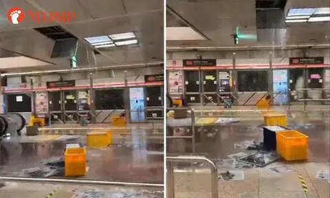 Commuters met with water gushing from dislodged ceiling panel at Raffles Place MRT station