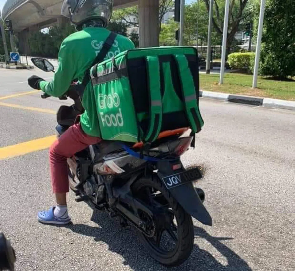 Delivery riders with Malaysian motorbikes are apparently not uncommon.