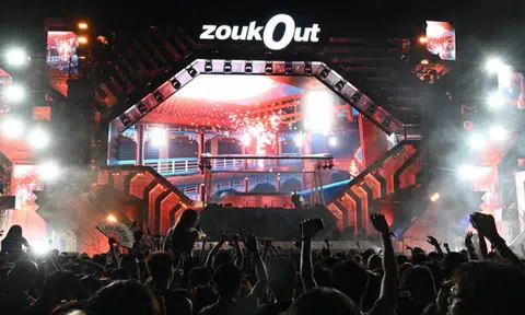 Woman arrested for splashing alcohol on police officers at ZoukOut event