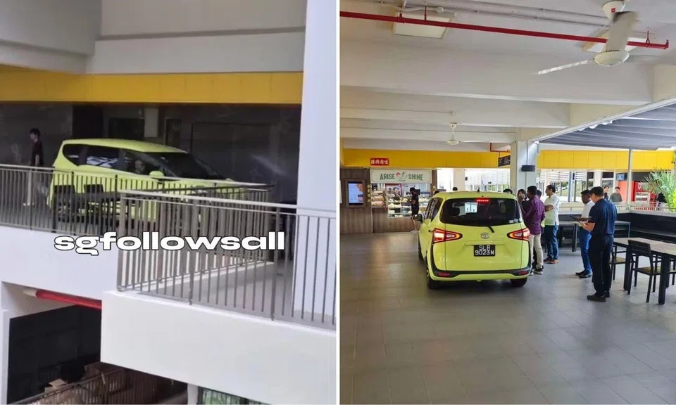 The car was spotted driving along a narrow corridor in the building.