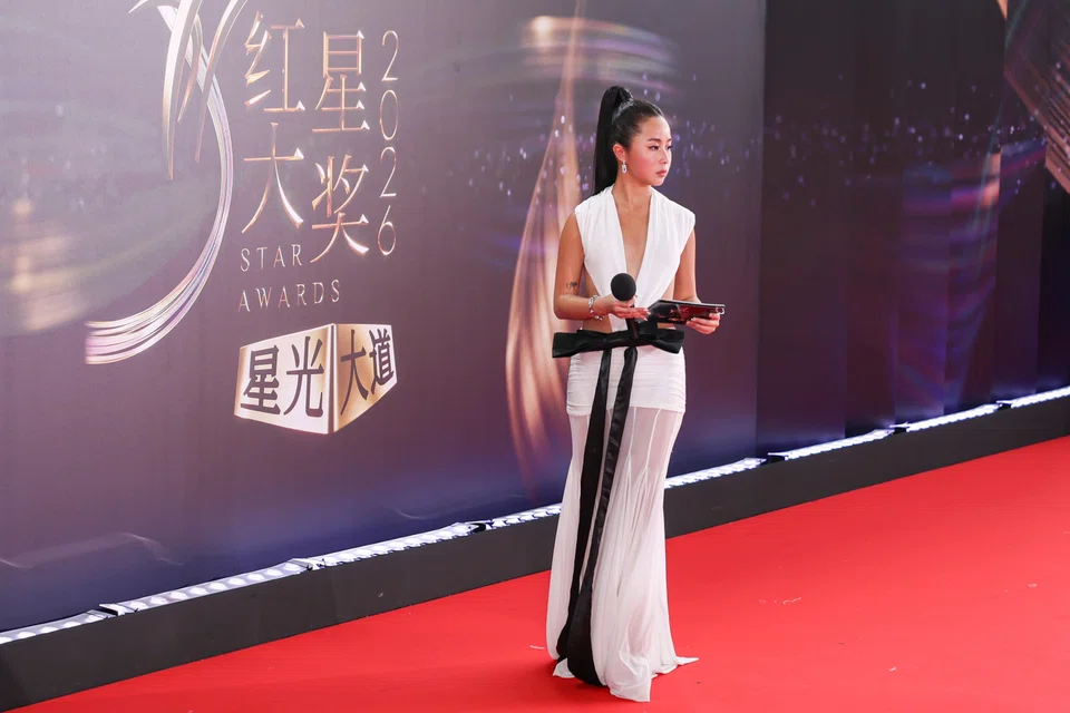 Radio DJ Germaine Tan on the red carpet at the Star Awards at Mediacorp on April 19. 