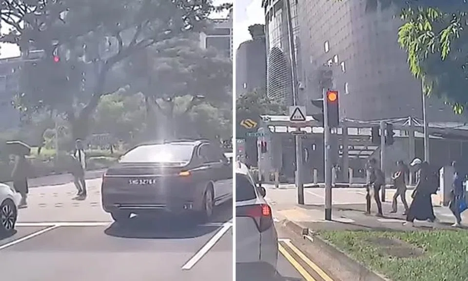 BMW driver running a red light. 