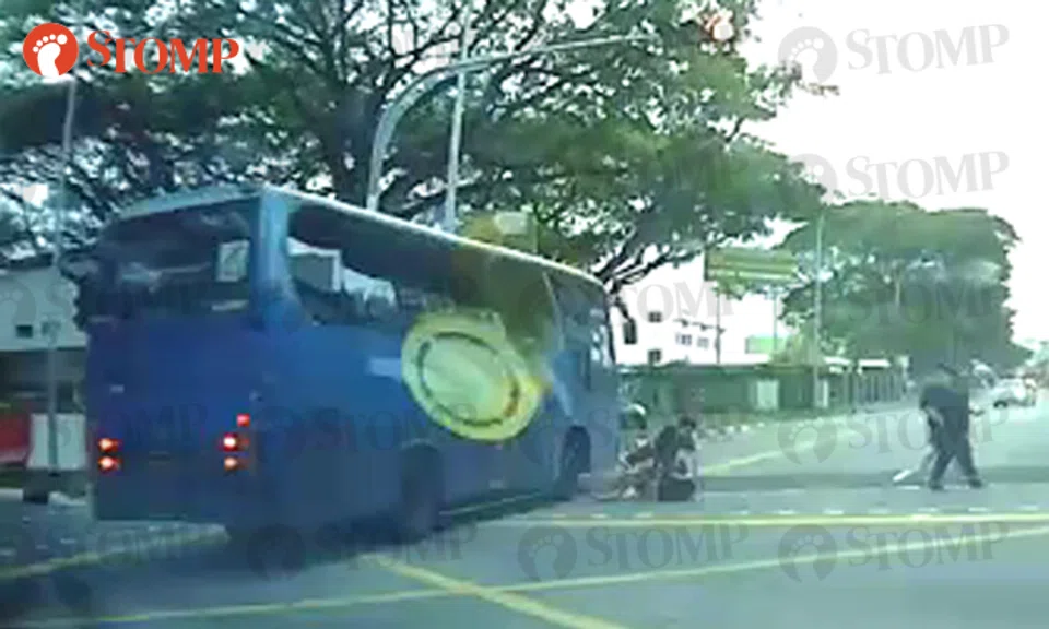 Bus knocks down cyclist after beating red light at pedestrian crossing ...