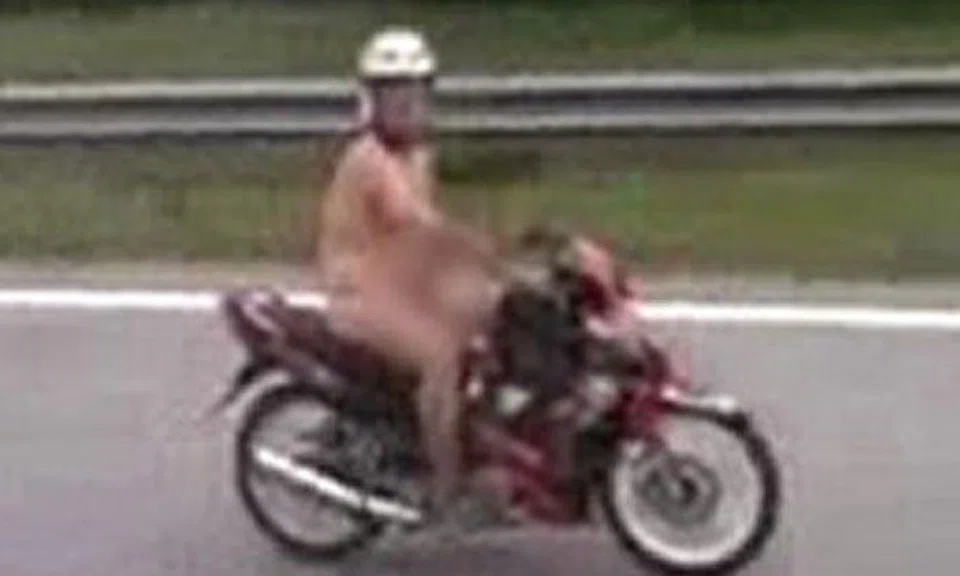 Man rides scooter nude -- and does not seem shy about it