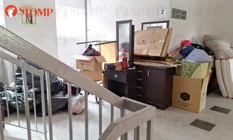 Residents dumping rubbish illegally at Hougang block even after inspection by NEA and town council