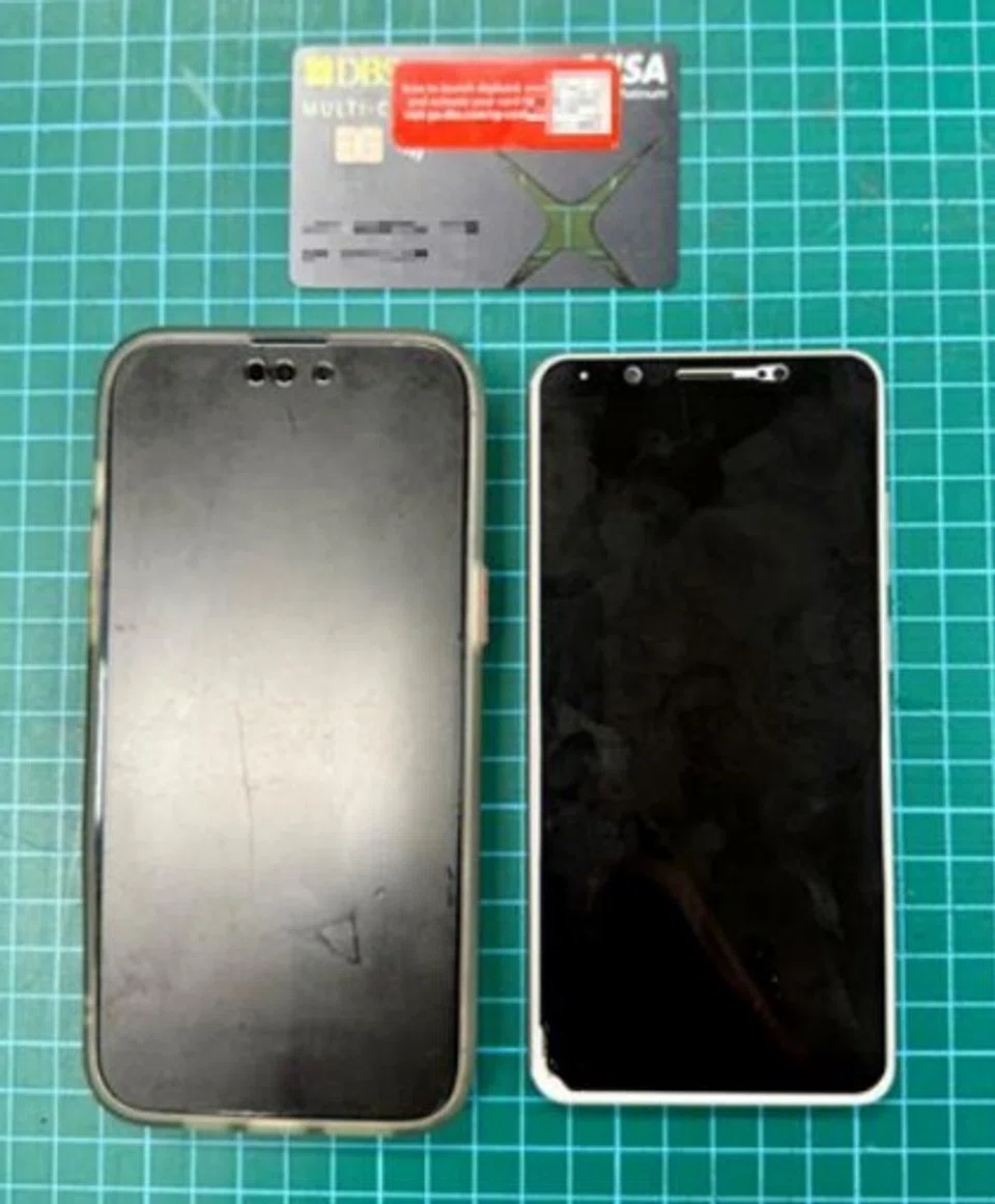 A bank card allegedly belonging to another person and two handphones were found in his possession and seized.