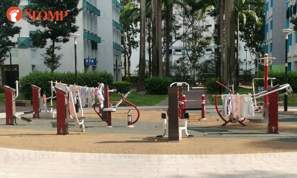 Hougang resident 'conquers' fitness corner by hanging laundry on bamboo poles