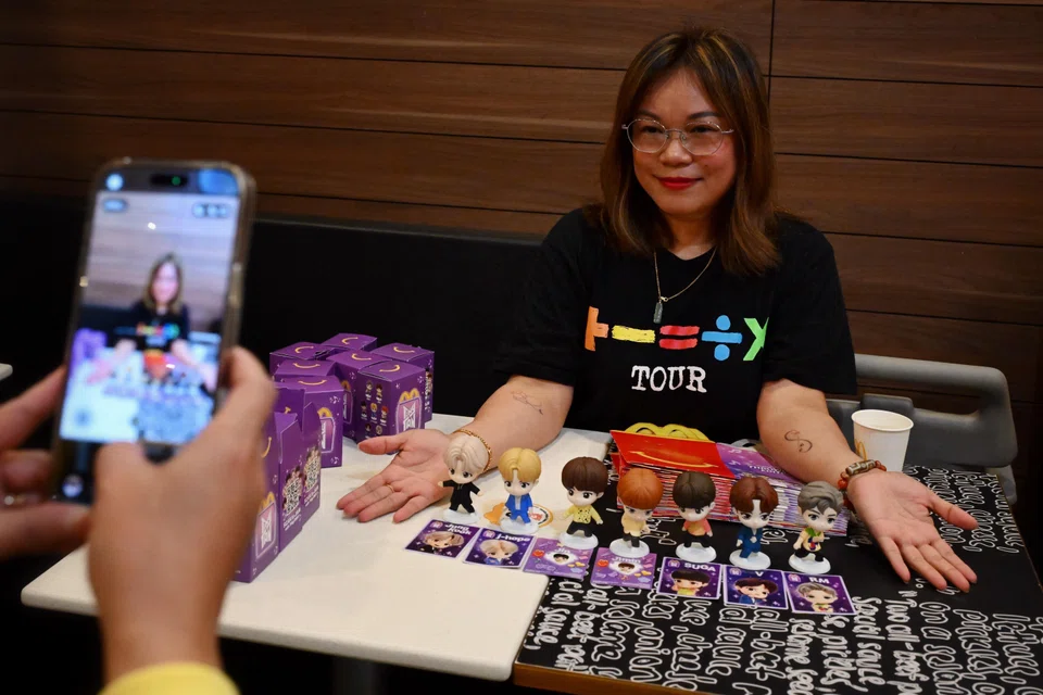 BTS fan Tess Poh bought 14 Happy Meals at a go, and managed to complete her full set.