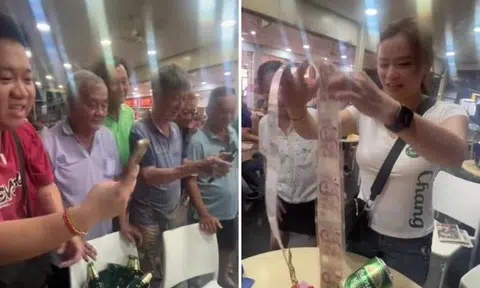Loyal customers celebrate beer promoter's birthday with multiple cakes, one has $160 cash inside