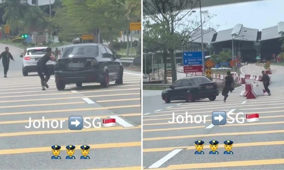 malaysian car crashing through barrier and speeding towards singapore