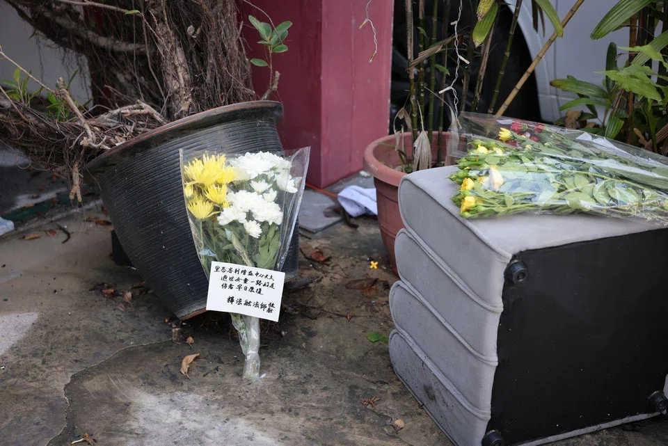 Several bouquets of flowers were left at the scene, which has been cordoned off.
