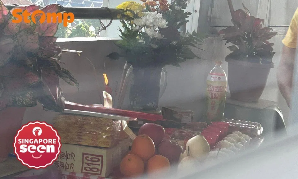 lorong lew lian resident burns offerings at common corridor