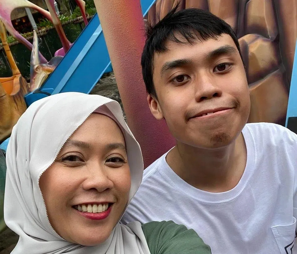 Madam Rossiana with her son Izhan, who is diagnosed with moderate autism.
