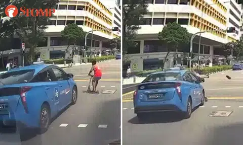 Boy sent flying after getting hit by taxi while crossing road on kick scooter in Bugis