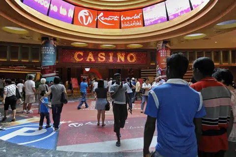 Foreign workers outside the casino at Resorts World Sentosa.