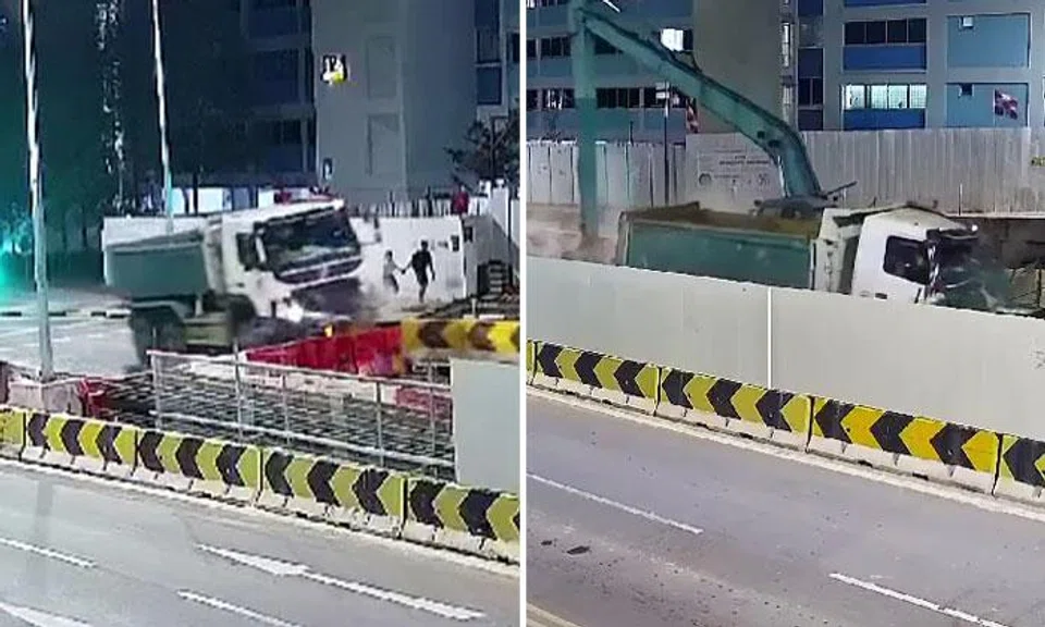 Tipper truck crashes into Pasir Ris construction site, startling pedestrians at 1.35am