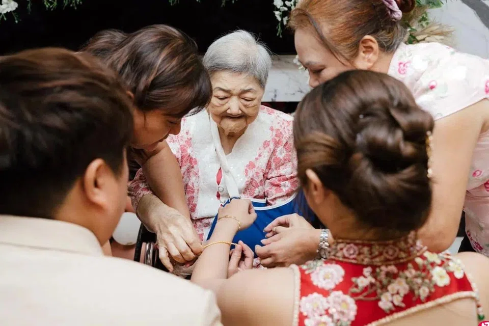 Madam Wang Yamei at her grandson's wedding in November last year.
