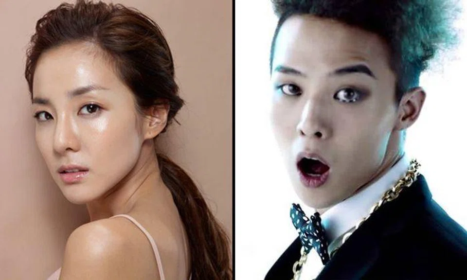 G-Dragon spotted kissing and protecting Sandara Park after concert