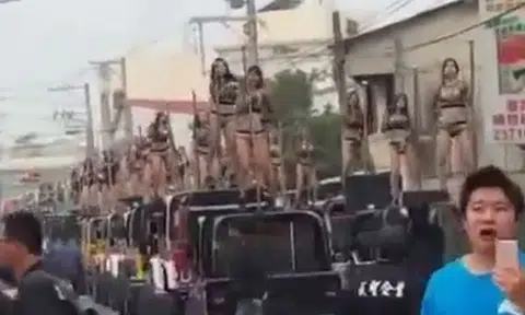 Scantily-clad ladies pole dance on top of jeeps for Taiwanese official's funeral