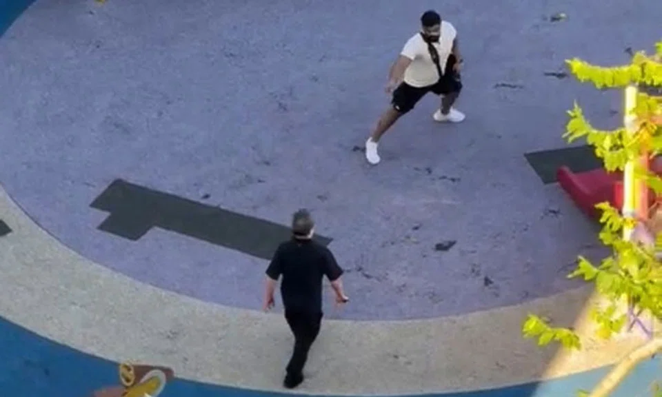 A video of the incident seen by The Straits Times showed people shouting at a man believed to be the assailant, dressed in black. PHOTO: LIANHE ZAOBAO READER