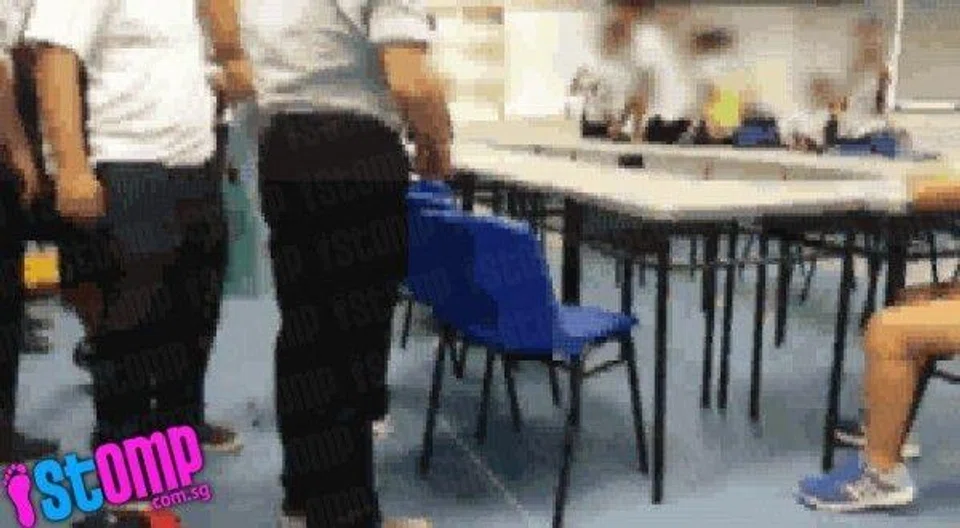 Students break out into fight during lesson at Peicai Sec -- as female teacher watches helplessly