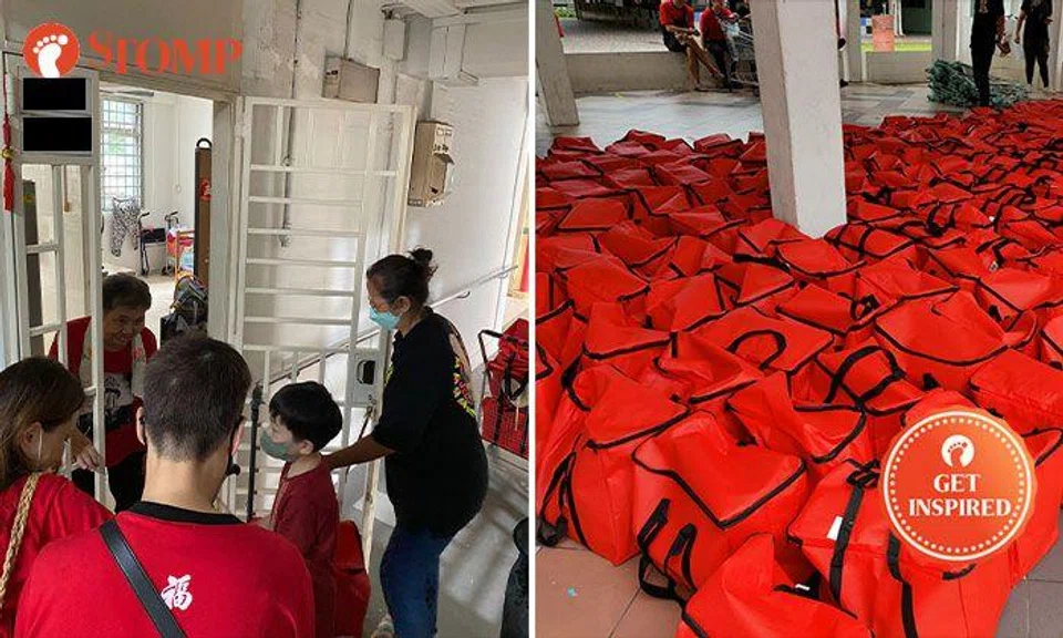 50 volunteers work together to give food rations and items to 300 elderly residents at North Bridge Road