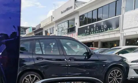 Child in idling BMW gets into driver's seat, causes collision with Lexus in Serangoon
