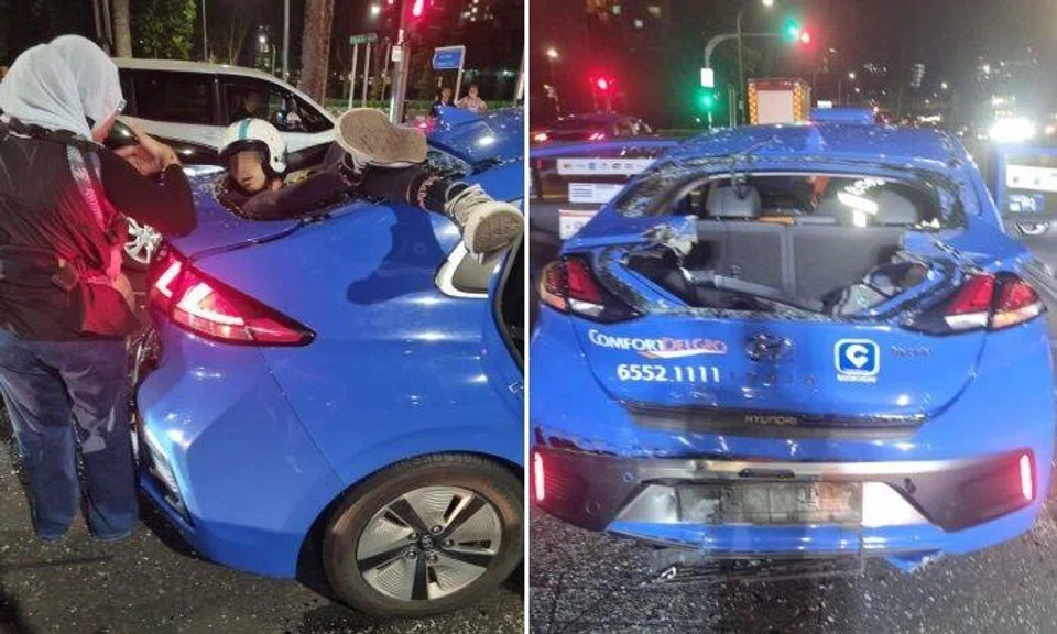 He had apparently smashed through the glass of the rear windshield and was stuck in the frame.